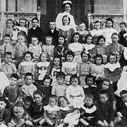 Group portrait of matron, sisters and children of the Queen Alexander Home, Coorparoo